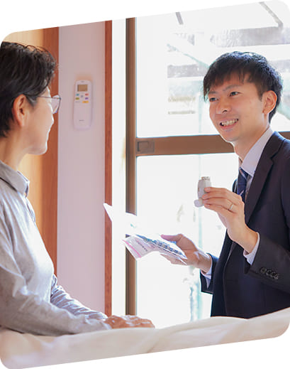 スライドショーの画像01 訪問している薬剤師の写真